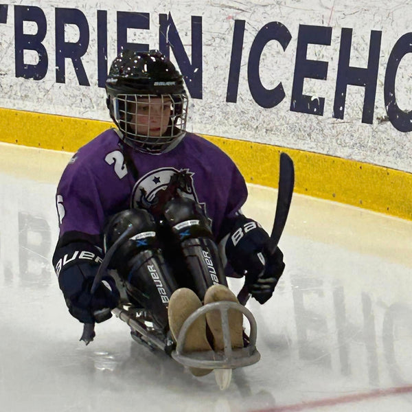Para Ice hockey athlete in action