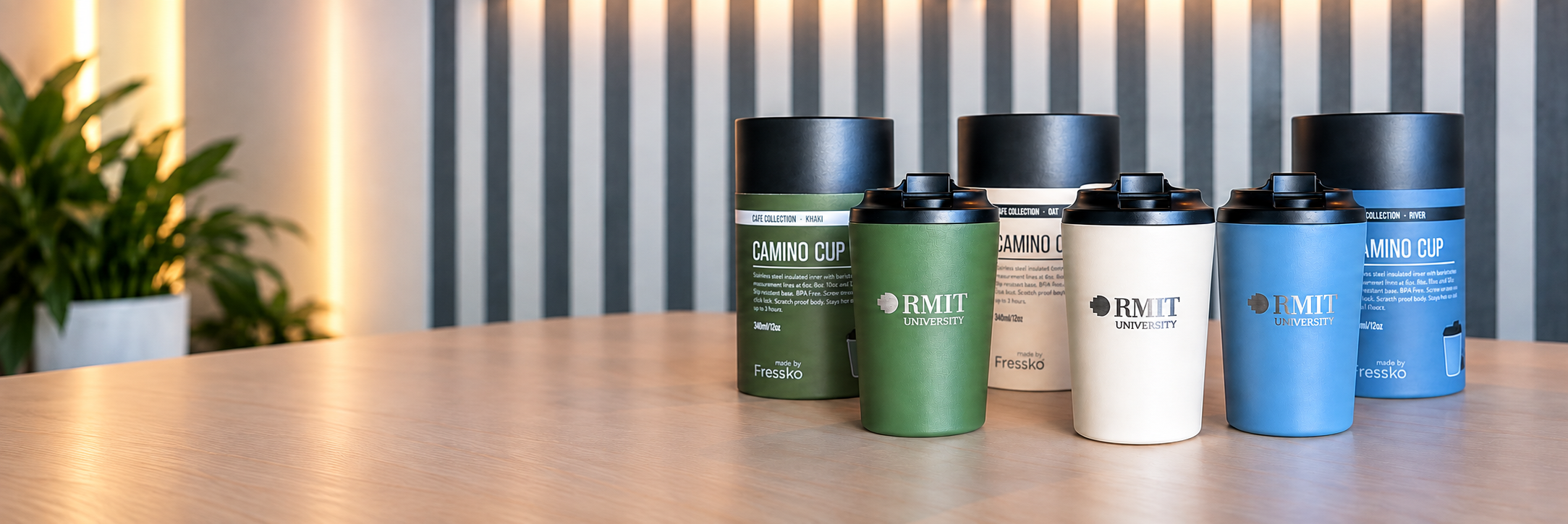 RMIT Everyday Reusable Cups in Khaki, Oat and River displayed with matching packaging on a table.