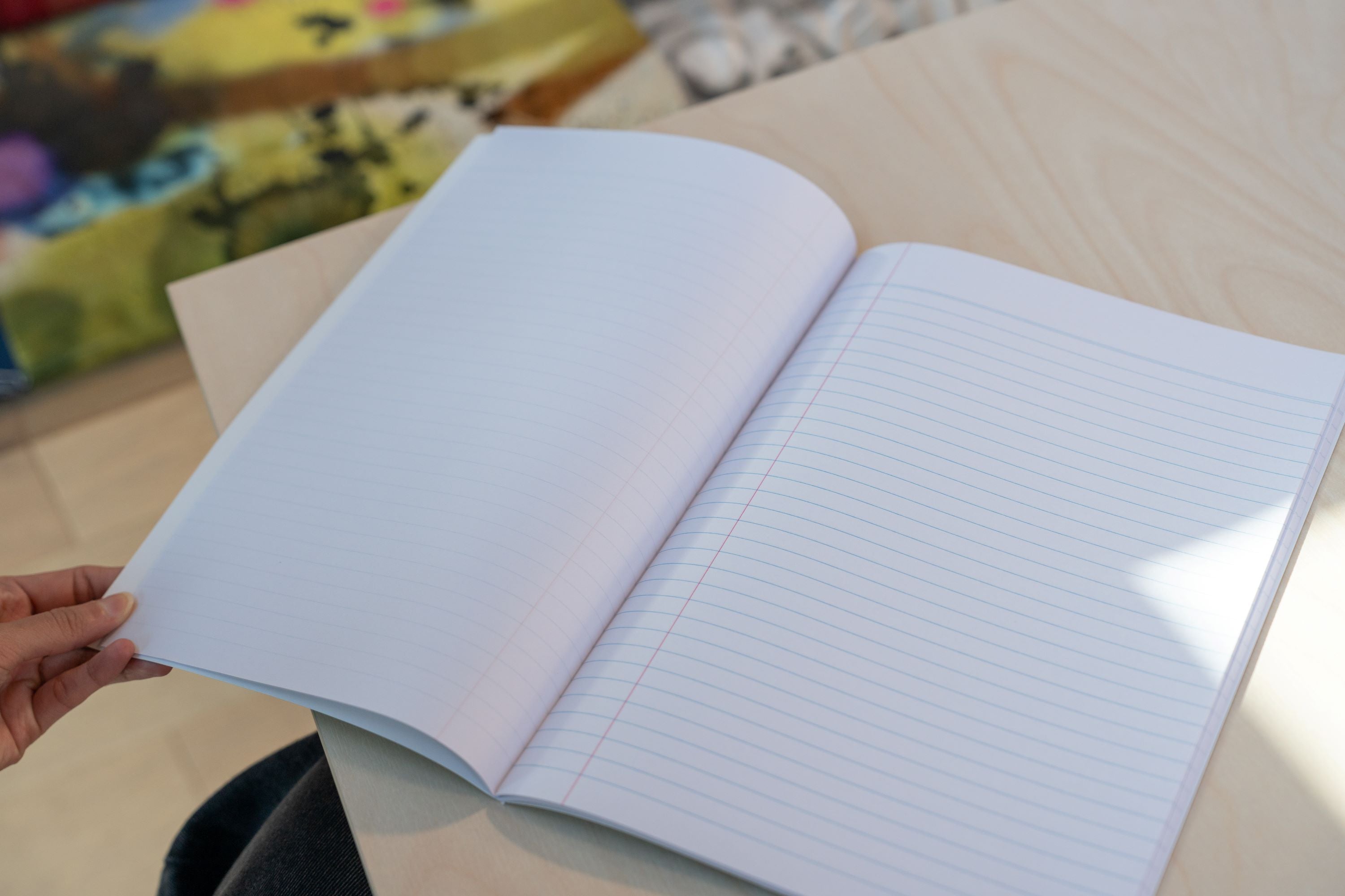 Open 64-page lined exercise book with a clean, minimalist design, part of the RMIT Store Laboratory Technology Kit.