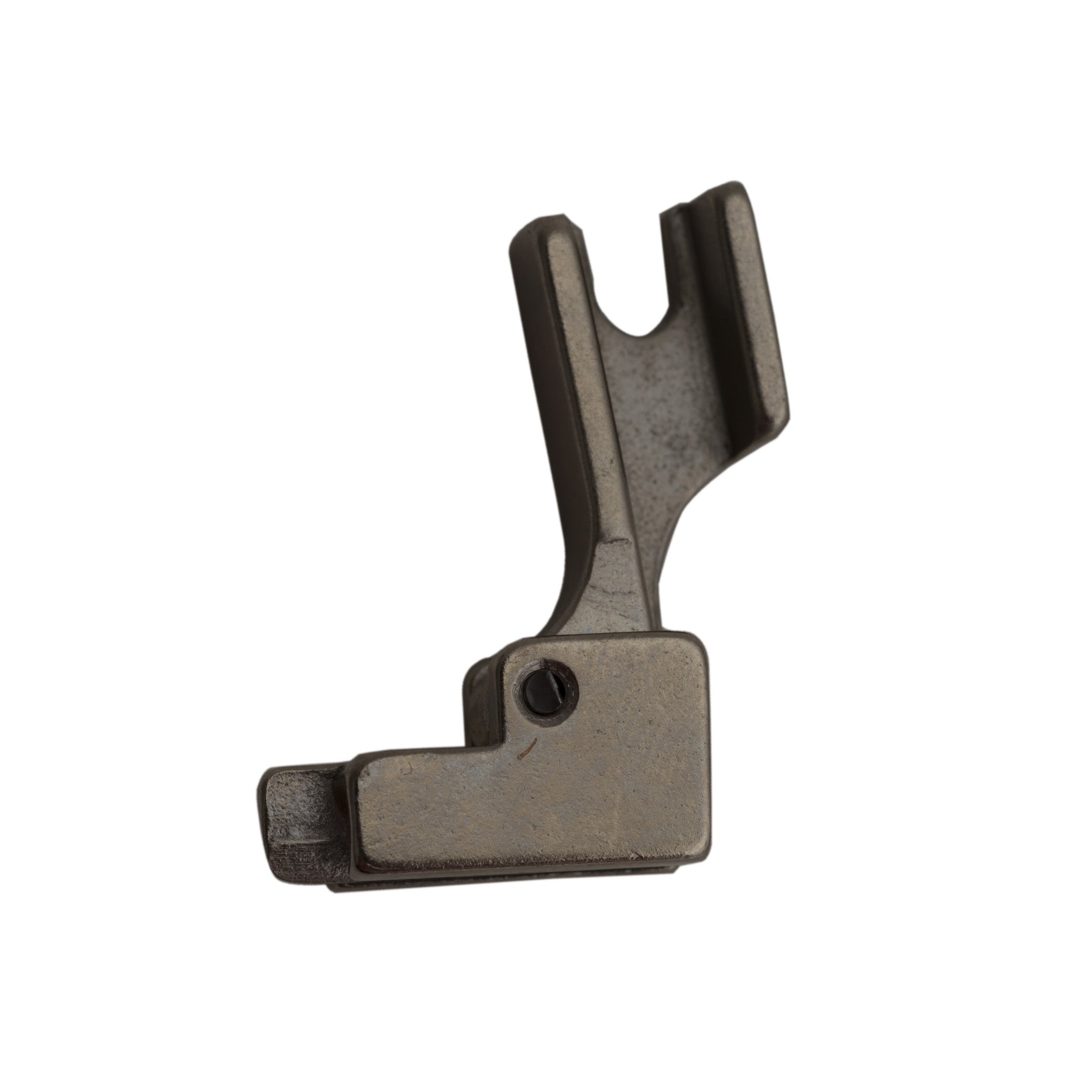 Close-up side view of a silver invisible zipper foot attachment, showing its curved metal structure and hollow centre with a narrow groove for guiding the zipper. Available from the RMIT Store.