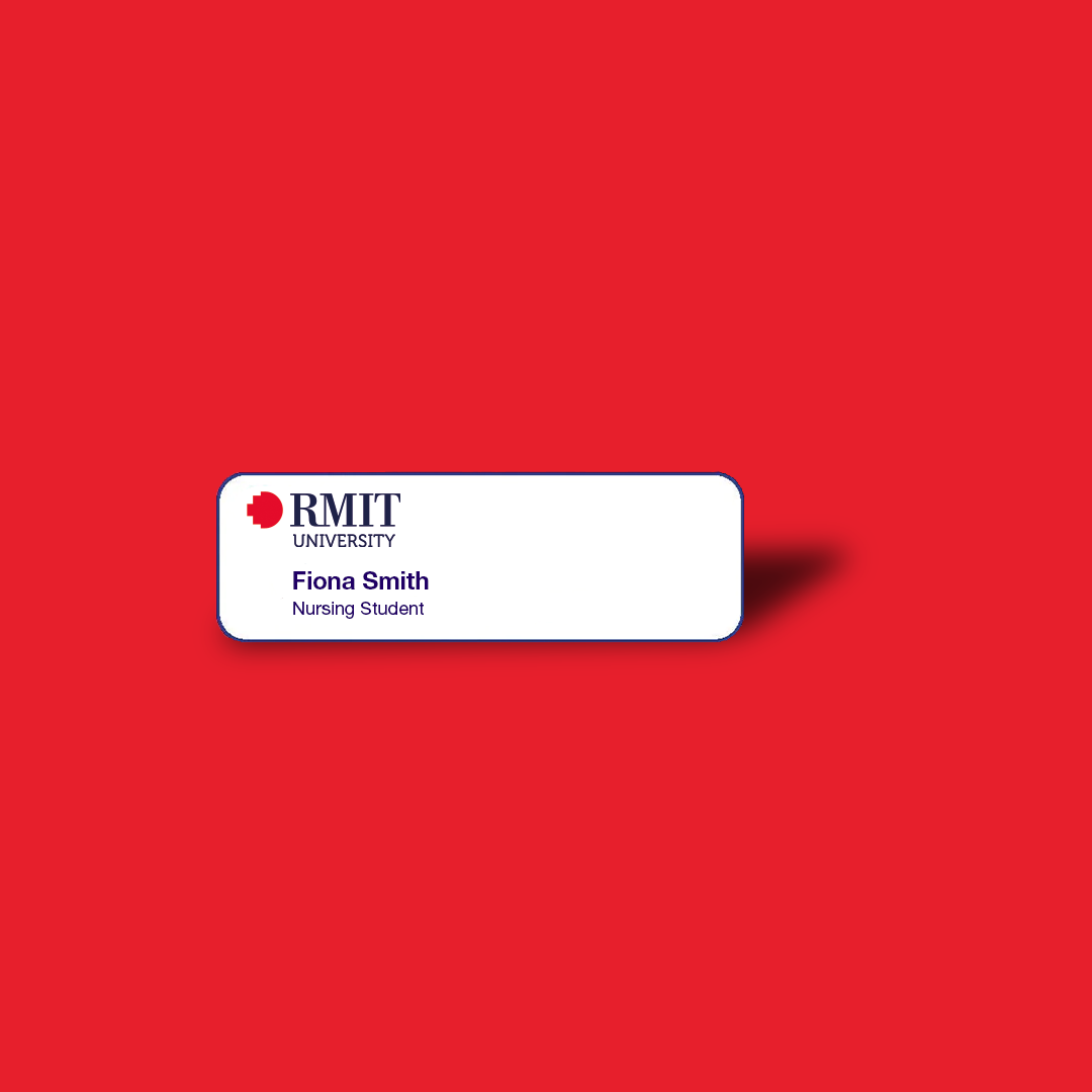 Illustrative name badge for RMIT Nursing students, with a simple white background and a red and black RMIT University logo in the top left. A mock student name is printed below, followed by “Nursing Student” as the department. Available at RMIT Store.