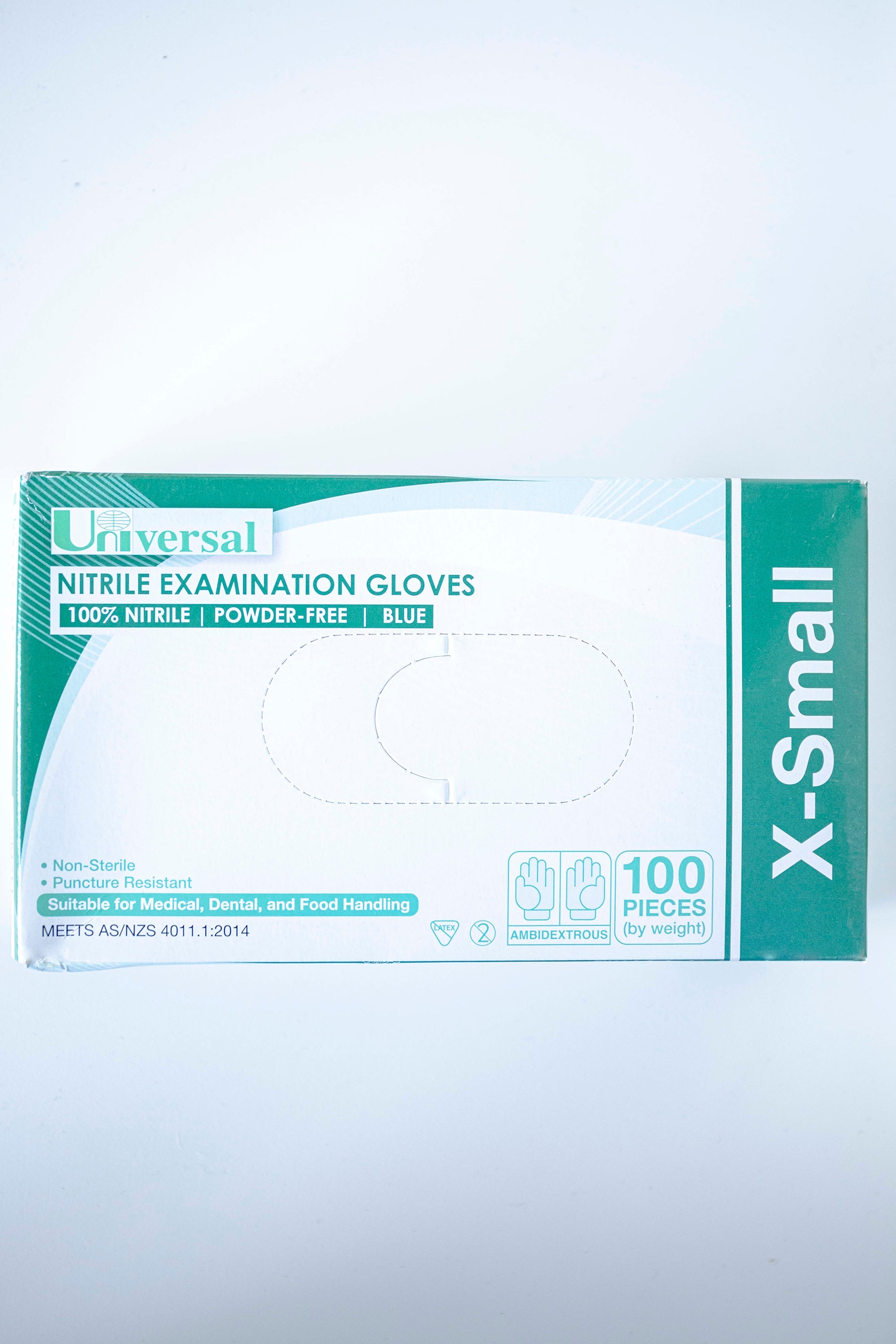 Box of RMIT Store Nitrile Gloves in Extra Small size, featuring green and white packaging with bold text indicating "Nitrile Examination Gloves," laid flat on a plain surface. The size "X-Small" is clearly visible on the box front.