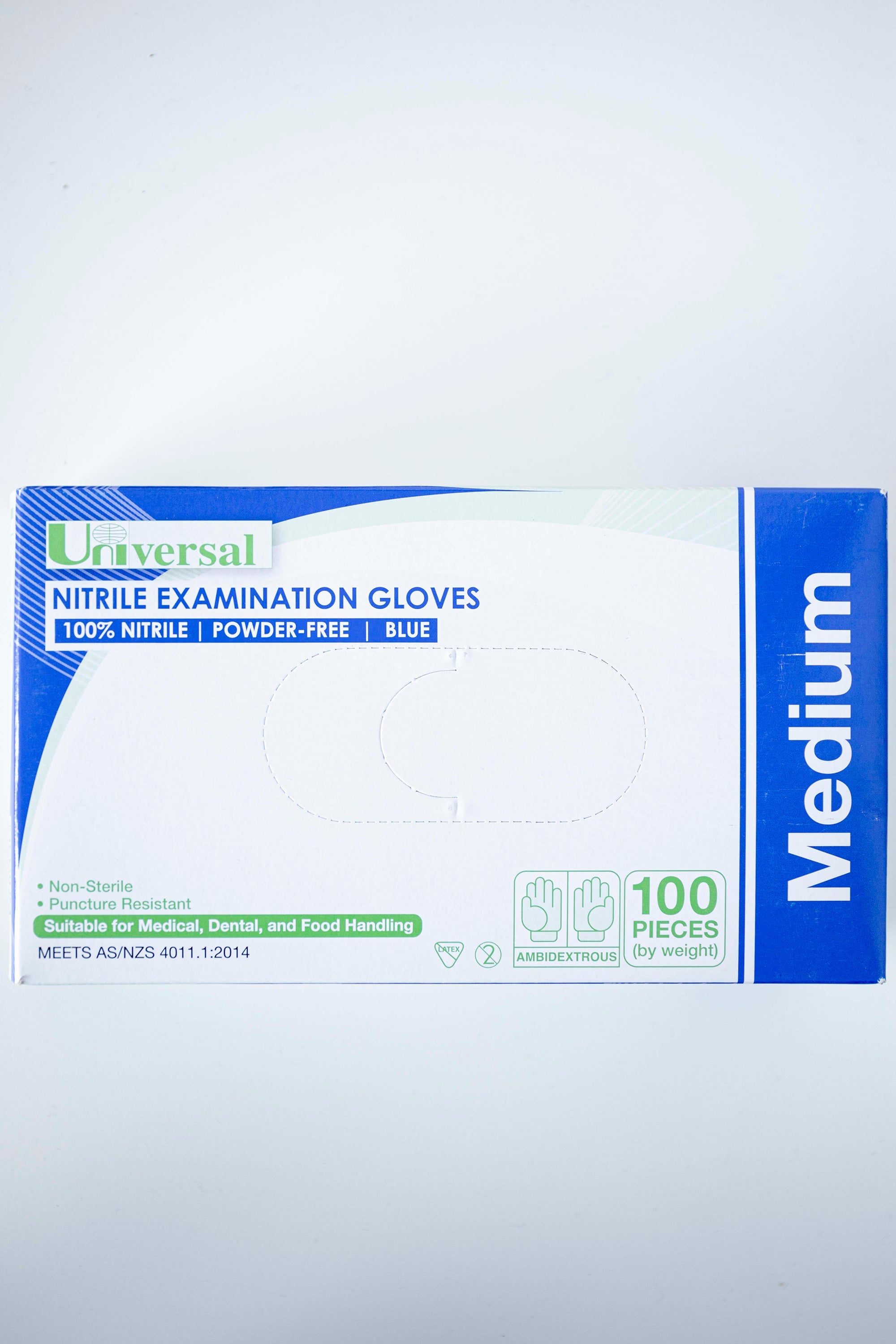 Box of RMIT Store Nitrile Gloves in Medium size, featuring blue and white packaging with bold text indicating "Nitrile Examination Gloves," laid flat on a plain surface. The size "Medium" is clearly visible on the box front.