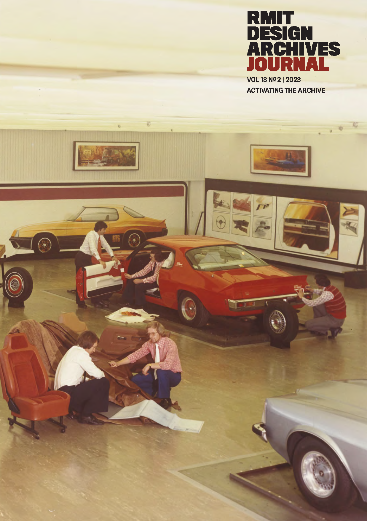 RMIT Store RMIT Design Archives Journal Vol. 13 No. 2 2023, Activating the Archive, front cover featuring a warm-toned archival photograph of a design studio with an orange car, automotive drawings and models working around vehicles and upholstery, with the black and dark red journal masthead at the upper right.