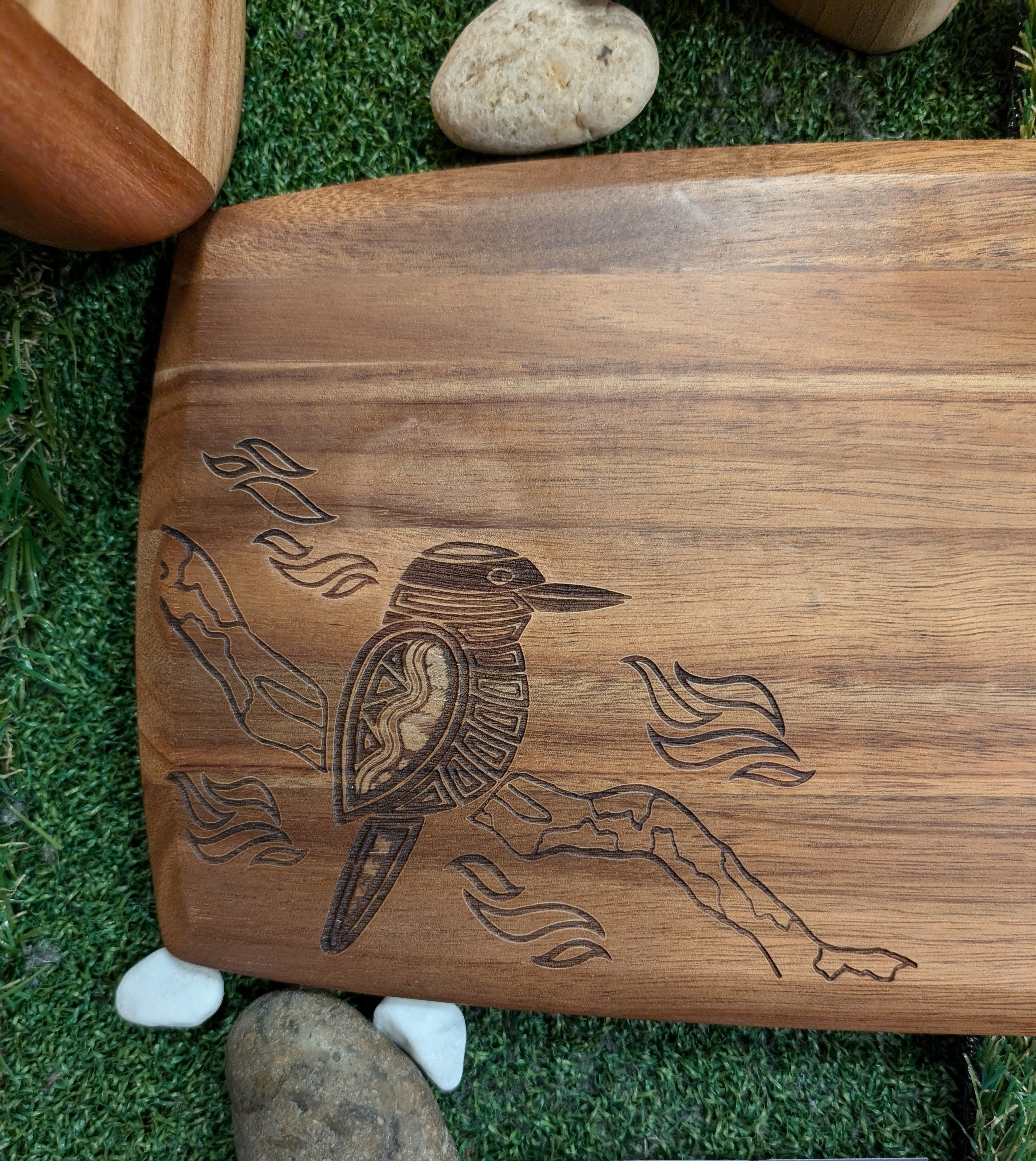 Ngarga Warendj Indigenous Australian designed Kookaburra engraved Acacia Wood Platter with RMIT Branding.  Kookaburra engraved design shown close up for detail.