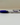 RUSU Pen in white and purple with a purple RUSU logo. Side view lying flat on surface.